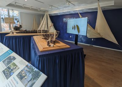 Model ships at the Buried Ships of Robinson Landing exhibit at the Office of Historic Alexandria