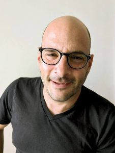 Headshot of new team member Adam Prost